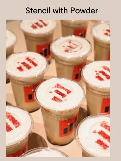 Custom logo stencil in powder on drinks